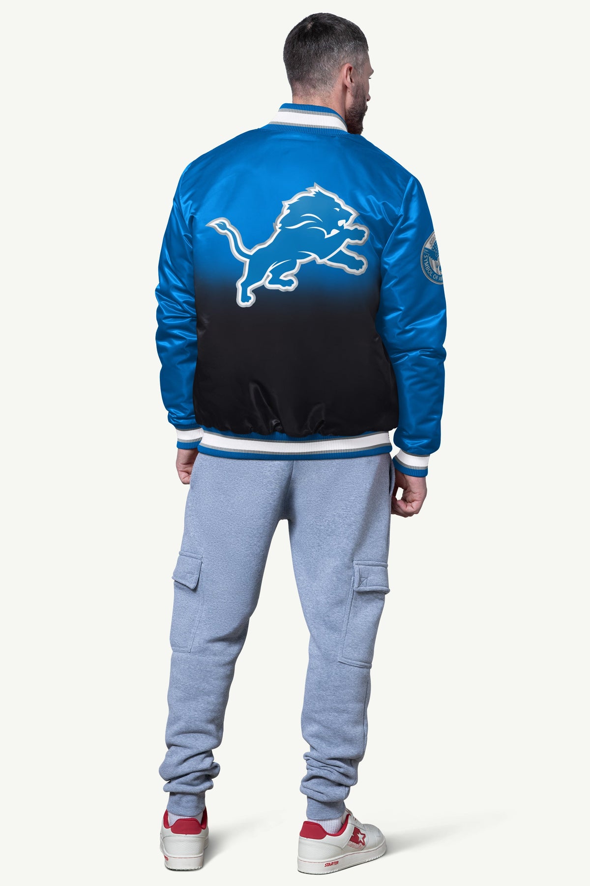 Starter Best Seller / MENS DETROIT LIONS PASS RUSH SATIN VARSITY JACKET